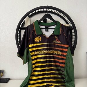 Disney Pride Rock Polo Shirt with Green and Orange Accents